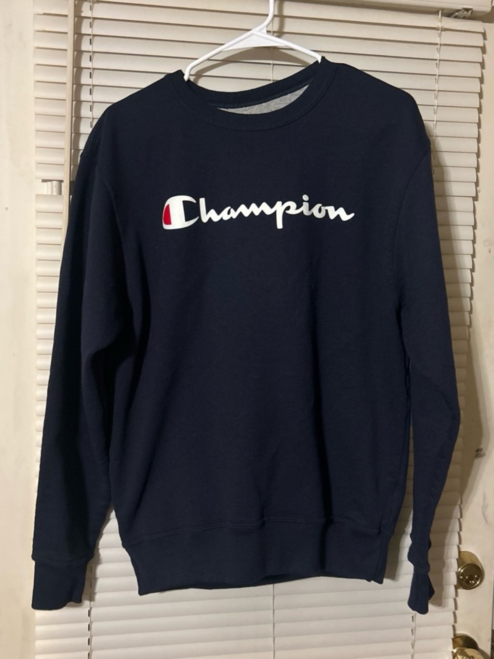 Champion Navy Crewneck with White Script Logo and Red Accent